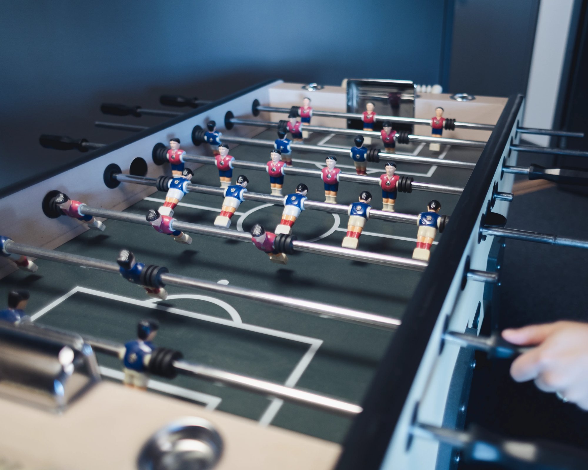 An image of a football game at the TeQflo office.