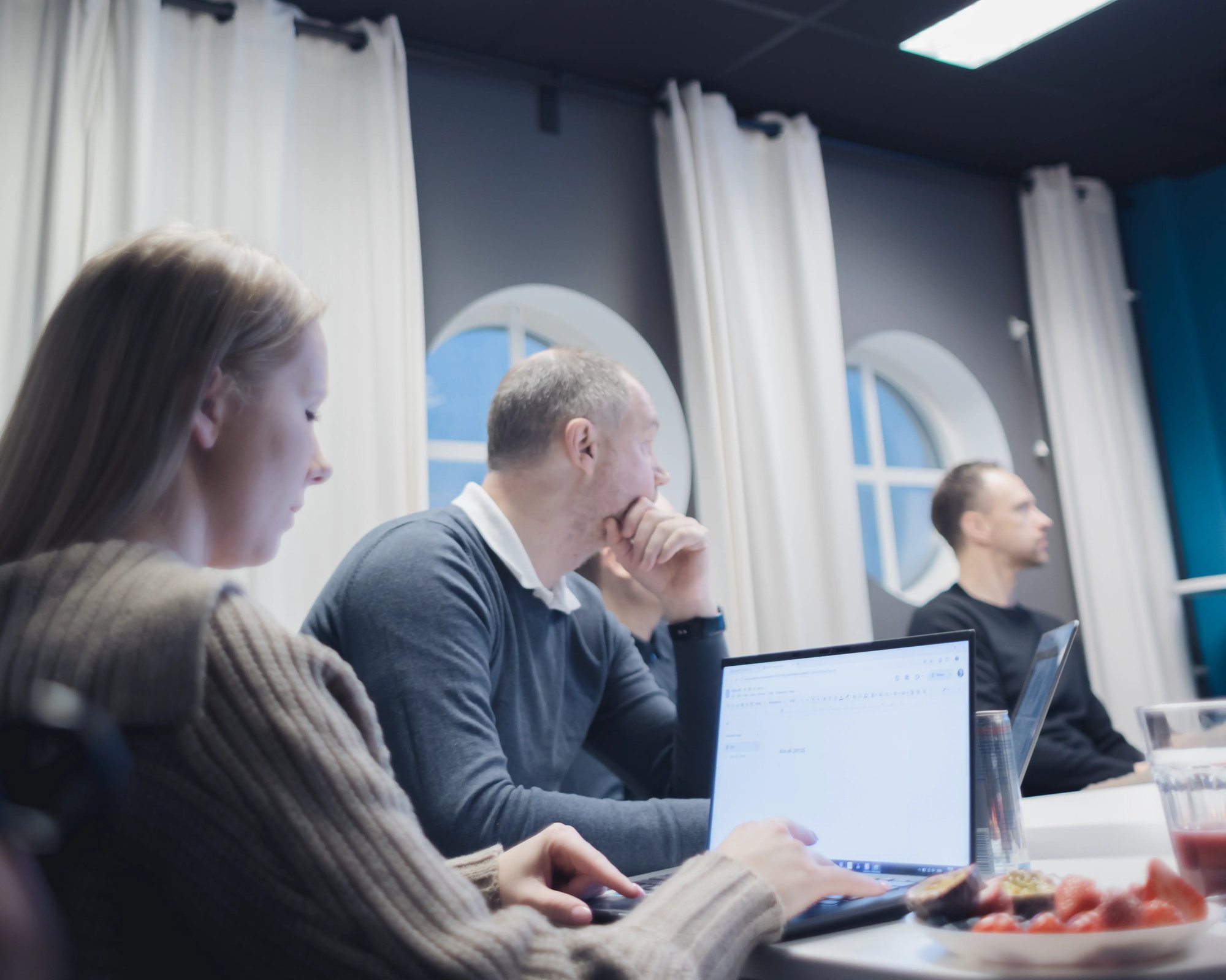 An image of emplyees at the TeQflo office