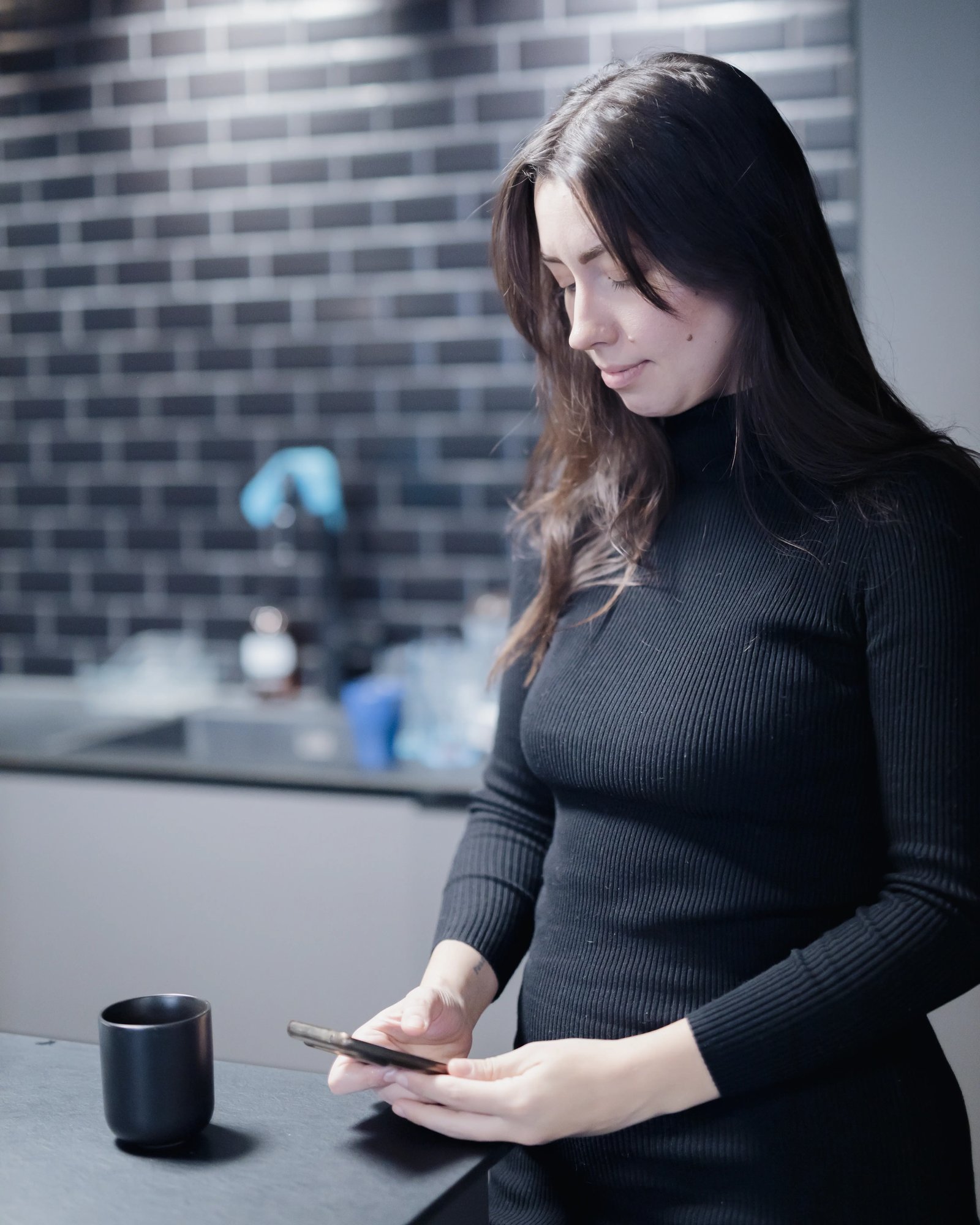 A picture of a TeQflo employee in a kitchen